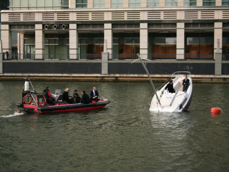 Ephemeral Elegance of Julien Berthier’s Floating Yacht Sculpture at Canary Wharf